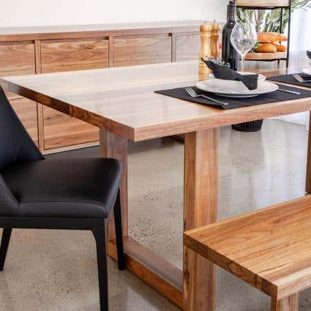 Hotham Square Dining Table in solid spotted gum with rich wood grain.