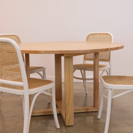 Stylish dining setting featuring Midland Extension Dining Table with matching chairs.